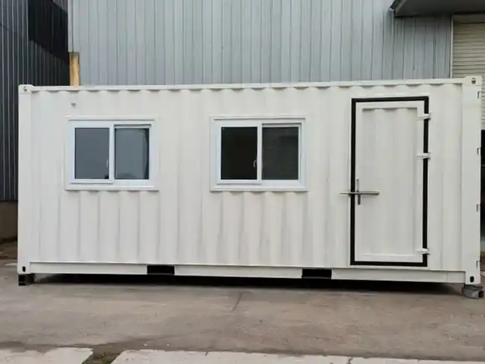 Office container exterior parked in a US industrial yard